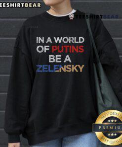 Hot 'I Stand With Ukraine' sweatshirt featuring a bold design, promoting support for Ukraine against Putin's aggression.