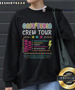 Nice cafeteria crew wearing 'Back to School' sweatshirts, showcasing the lunch lady dream team in a vibrant school setting.