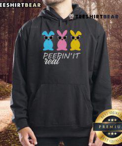 Alt Text: Stylish Nice Peepin' It Real Easter Bunnies hoodie featuring colorful bunny graphics for a fun spring look.