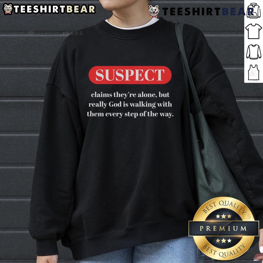 Nice suspect claims they're alone in stylish God is walking sweatshirt, featuring a bold graphic design and comfortable fit.