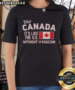 Womens tee featuring 'Visit Canada, Like the US Without the Fascism' slogan, promoting a positive travel message.