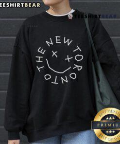 Alt Text: Official Tory Lanez The New Toronto Smiley Sweatshirt featuring vibrant graphics and a cozy design for fans.