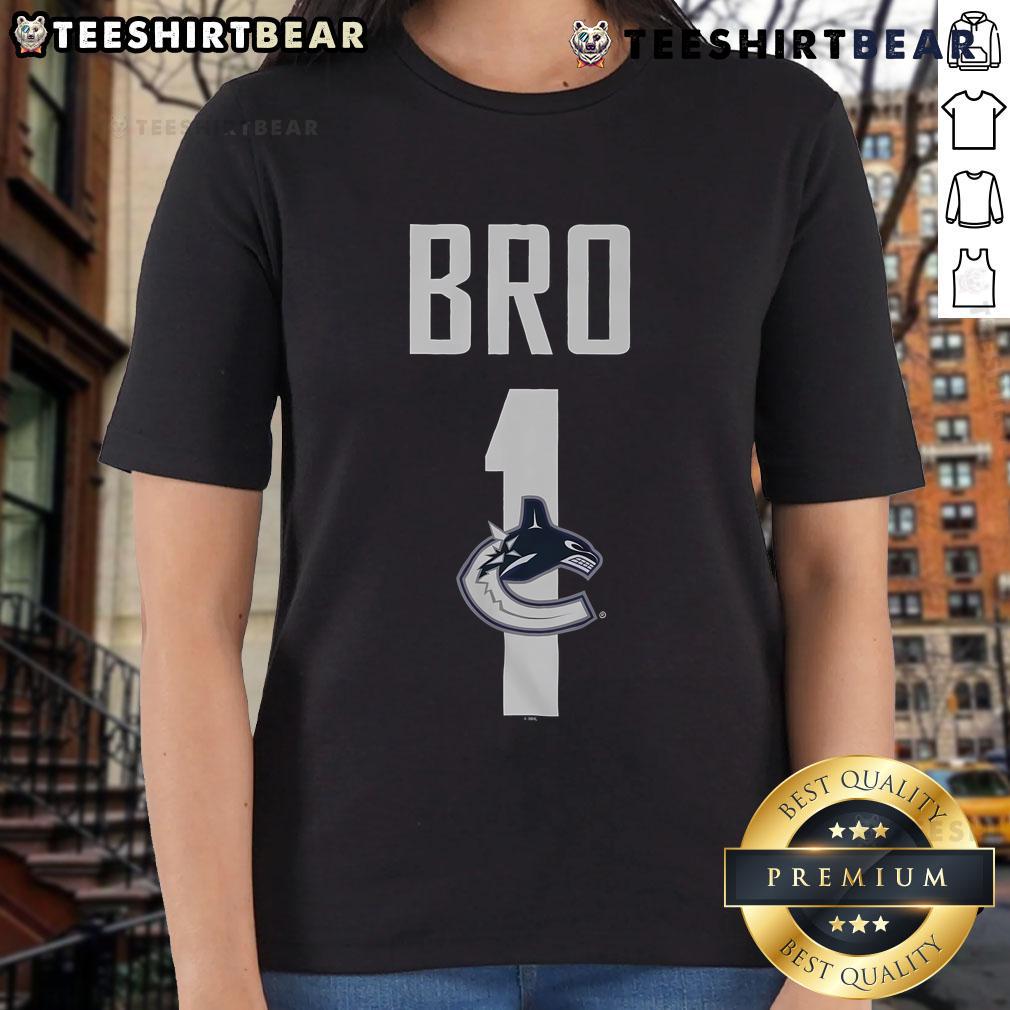 Official Vancouver Canucks Number 1 Bro Ladies Tee featuring vibrant team colors and stylish design for female fans.