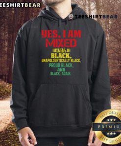 Person wearing an 'Official Yes I Am' mixed with black hoodie, showcasing trendy streetwear style and fashion statement.