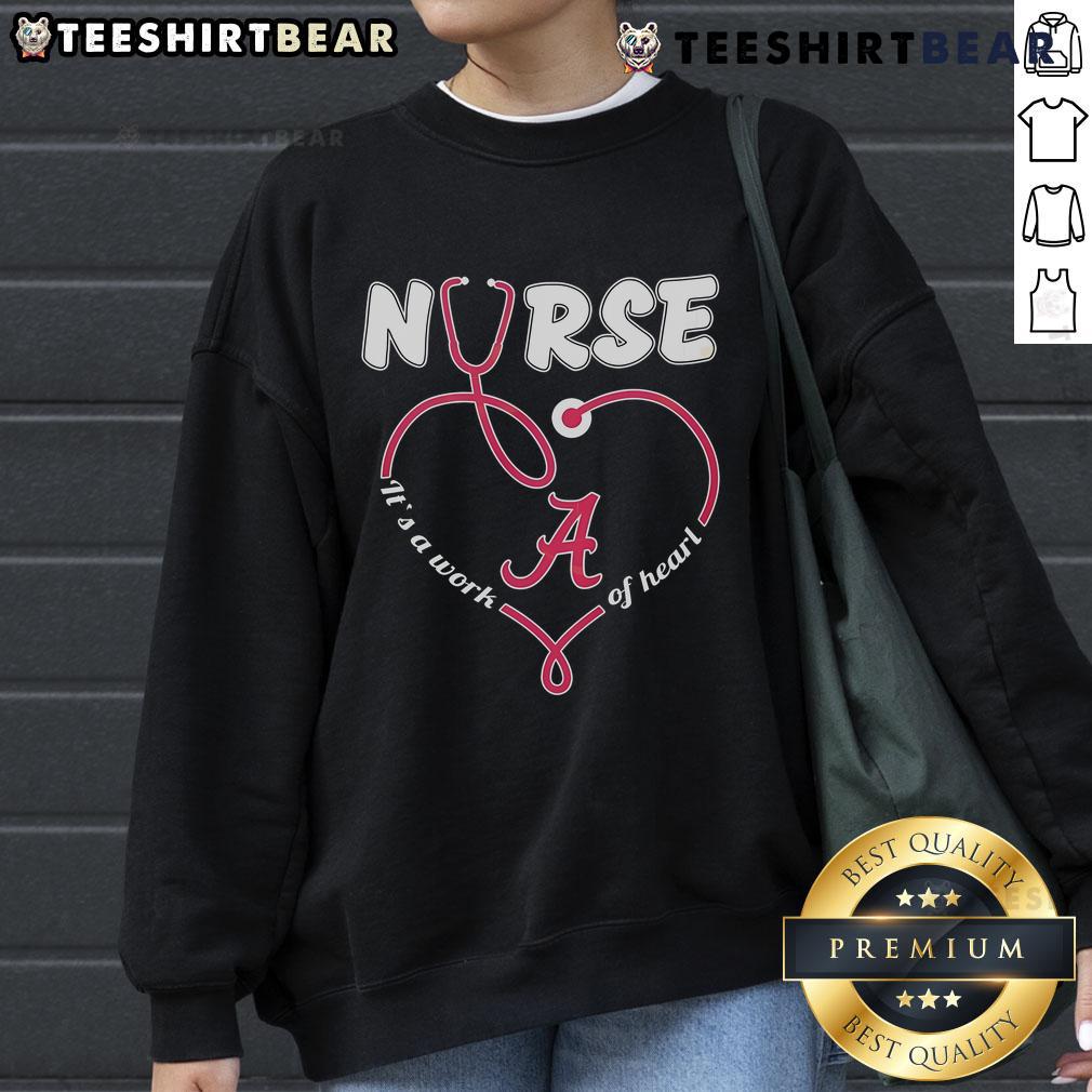 Original Alabama Crimson Tide Nurse 'It's A Work Of Heart' Sweatshirt in red, perfect for passionate nurses and fans.