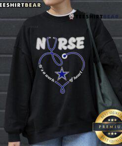 Premium Dallas Cowboys Nurse sweatshirt with 'It's A Work Of Heart' design, perfect for fans and healthcare workers.