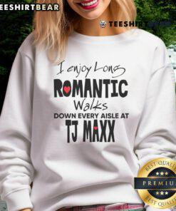 Alt Text: Woman wearing Pretty I Enjoy Long Romantic Walks Down Every Aisle at TJ Maxx sweatshirt while shopping in store.
