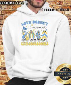 Teacher wearing 'Pretty Love Doesnt Count Chromosomes' hoodie, promoting inclusivity and support in education.