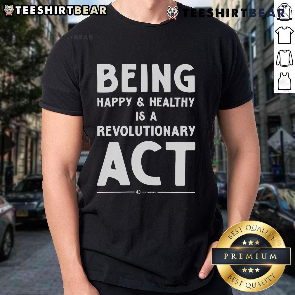 Alt Text: Top 'Being Happy and Healthy is a Revolutionary Act' T-Shirt in vibrant colors, promoting wellness and positivity.