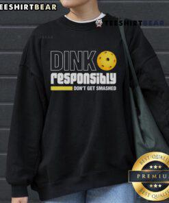 Top Dink Responsibly Don't Get Smashed Pickleball Sweatshirt featuring a fun pickleball graphic for enthusiasts.
