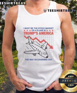 Trendy tank top reading 'I Must Be The Stock Market Or A Plane In Trump's America The Way I'm Crashing Out' fashion statement.