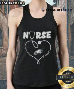 Top Philadelphia Eagles Nurse 'It's a Work of Heart' Tank Top for fans showcasing team spirit and healthcare pride.
