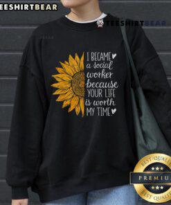 Top Social Worker sweatshirt featuring a sunflower design, celebrating Social Work Month in style.