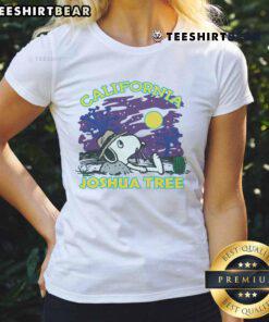 Alt Text: Cute Peanuts Snoopy X Joshua Tree National Park ladies tee featuring vibrant graphics of Snoopy in a desert landscape.