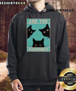 Funny cat wearing a hoodie with Are You Pooping? text, perfect for cat lovers and humor enthusiasts.
