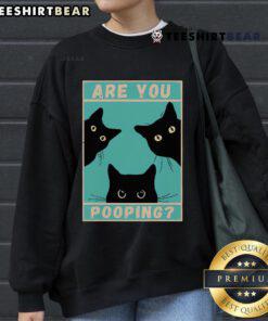 Alt Text: Funny cat sweatshirt featuring a playful design with the phrase Are You Pooping? perfect for cat lovers.
