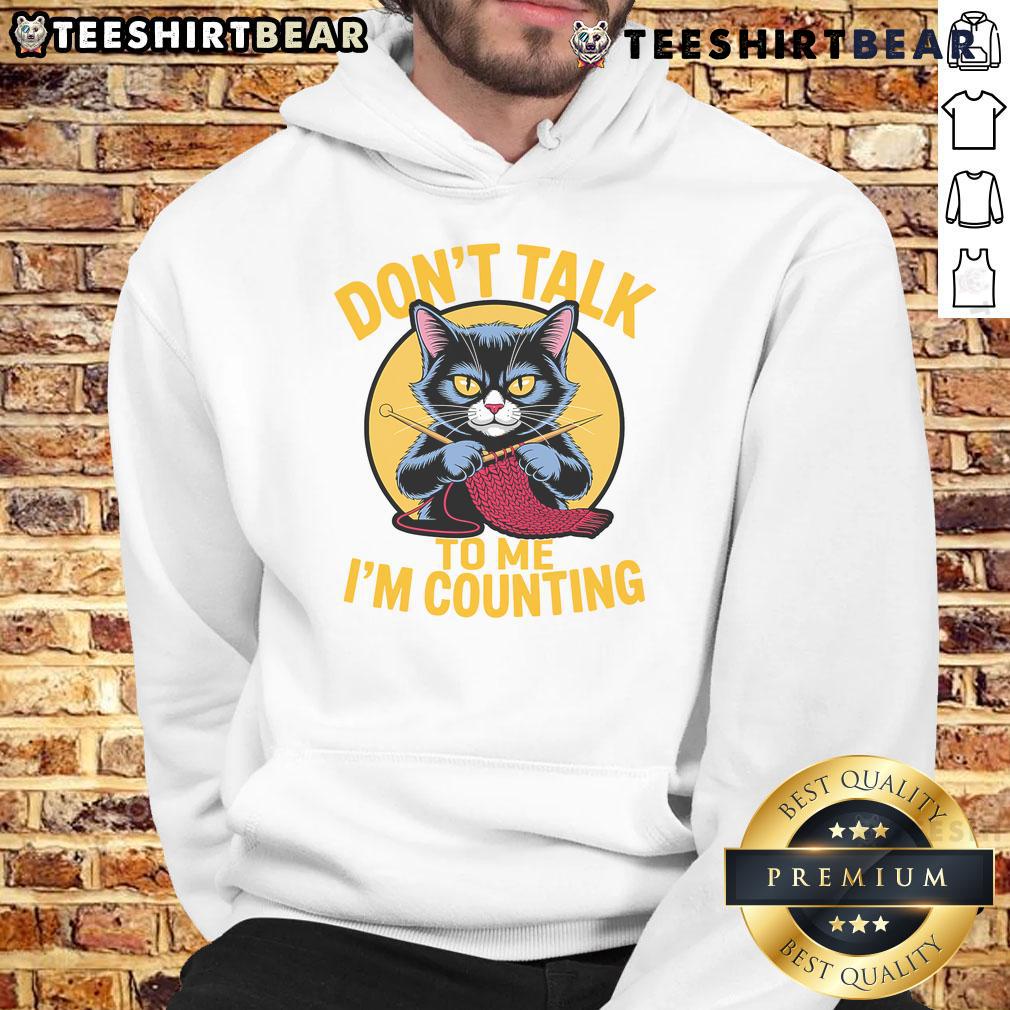 Funny cat in a hoodie with Don't Talk to Me, I'm Counting text, perfect for knitting lovers and cat enthusiasts.