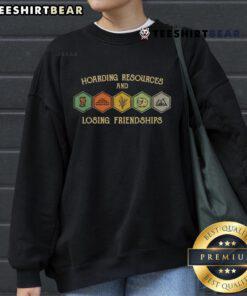 Alt Text: Funny hoarding resources and losing friendships sweatshirt featuring humorous graphics and text for casual wear.