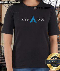 Funny 'I Use Arch Btw' meme on a ladies tee, featuring playful graphics and humorous text for tech enthusiasts.