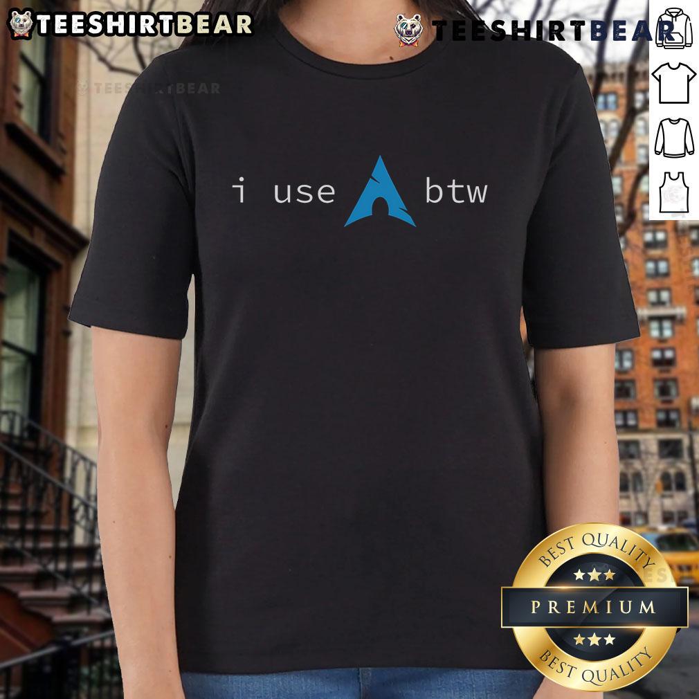 Funny 'I Use Arch Btw' meme on a ladies tee, featuring playful graphics and humorous text for tech enthusiasts.