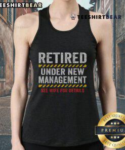 Funny retired husband in a retirement tank top at a lively retirement party, celebrating his new life chapter.