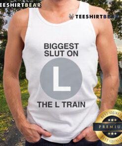 Model wearing 'Good Biggest Slut on the L Train' tank top, showcasing vibrant design and urban style on the subway.