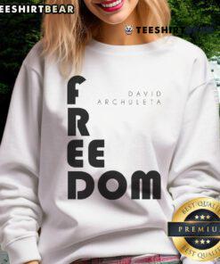 David Archuleta wearing a stylish Freedom Block sweatshirt, showcasing a trendy and comfortable look.