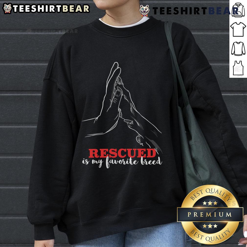 Cozy sweatshirt featuring 'Good Rescued Is My Favorite Breed' design, perfect for animal shelter rescue dog lovers.