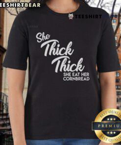 Good She Thick She Eat Her Cornbread Ladies Tee featuring vibrant design inspired by Boss Man Dlow's Shake Dat song.