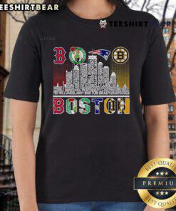 Boston skyline with sports team players' names on a stylish ladies tee for sports fans and fashion lovers.