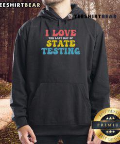 Alt Text: Student wearing a 'Good Test Day' hoodie, celebrating the last day of state testing with a smile.