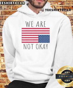 Vintage American flag hoodie with 'Hot We Are Not Okay' patriotic slogan, perfect for USA pride and casual wear.