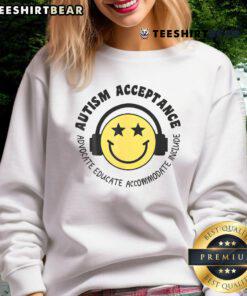Boy wearing a 'Nice Autism Acceptance' sweatshirt, smiling joyfully, promoting autism awareness and acceptance.