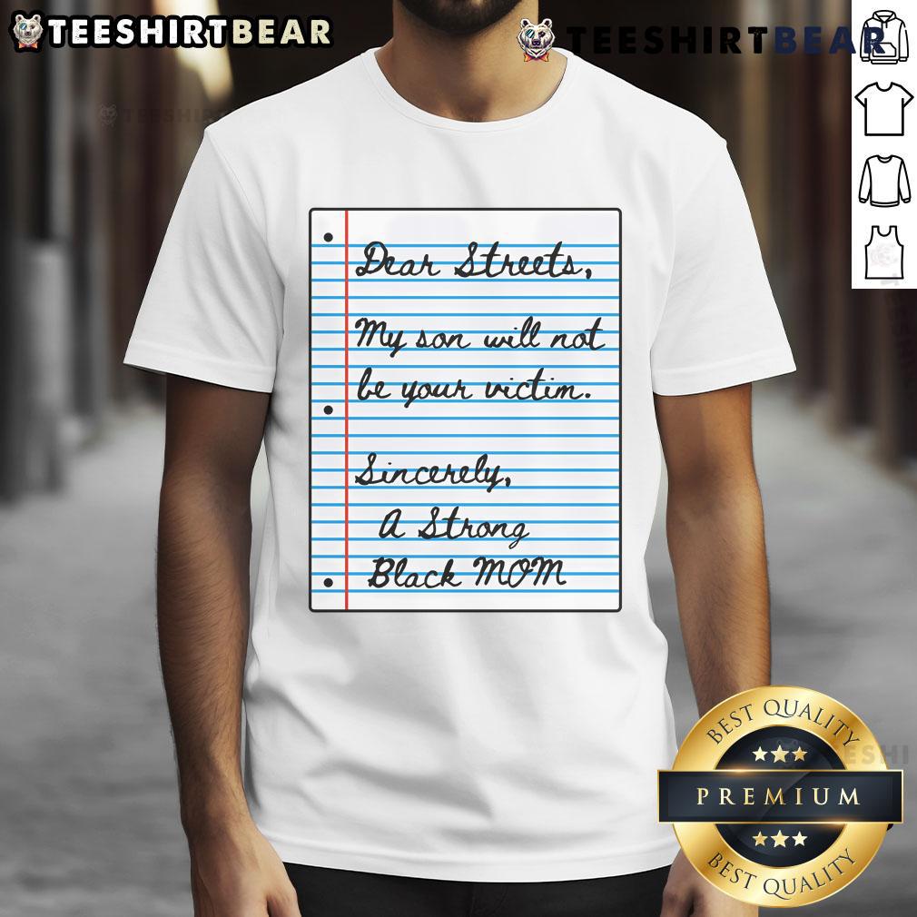 Alt Text: Strong Black mom wearing 'Nice Dear Streets My Son Will Not Be Your Victim' T-shirt, promoting empowerment and safety.