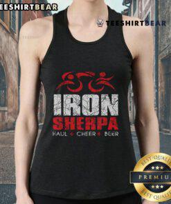Triathlete wearing a Nice Iron Sherpa tank top, celebrating with a beer after a triathlon event.