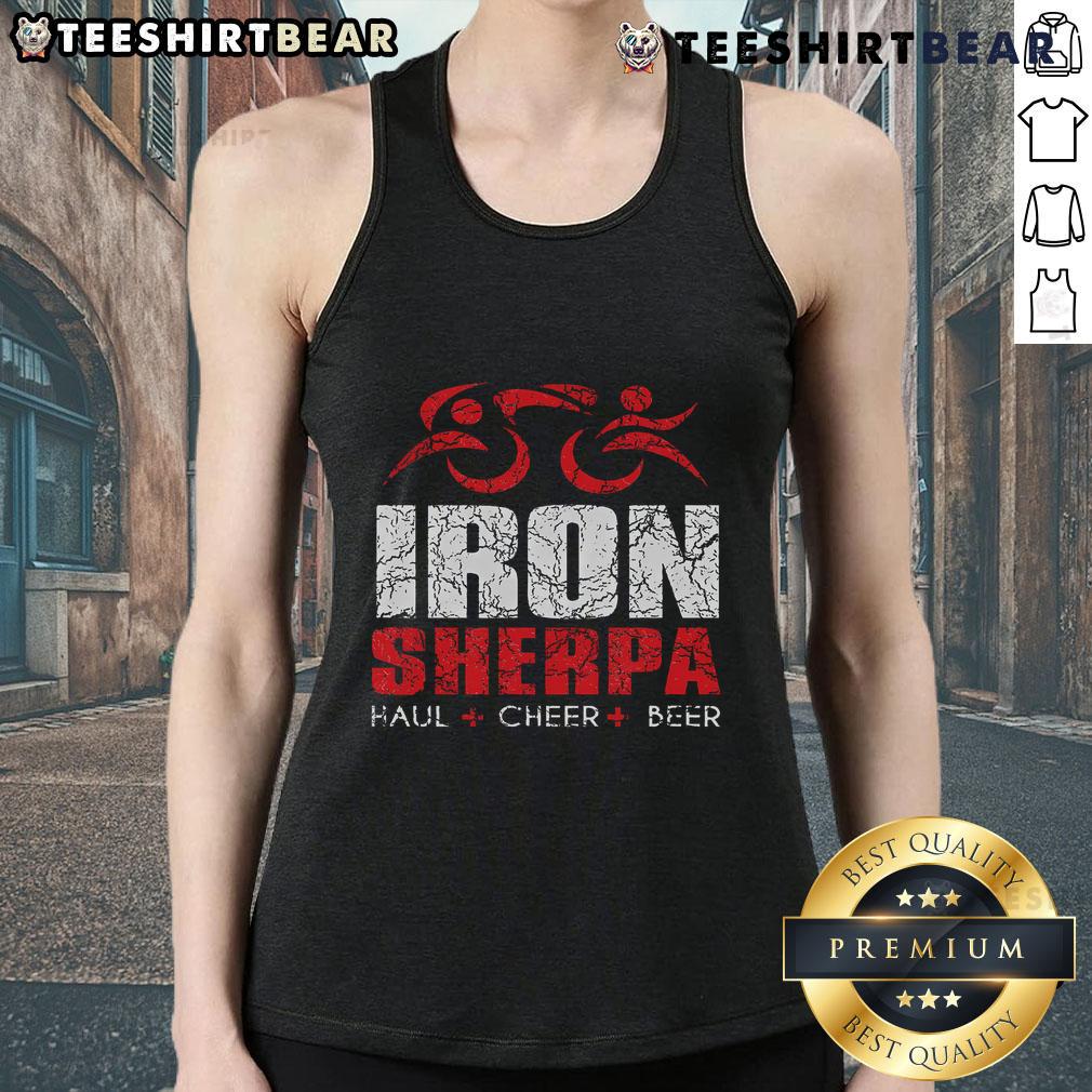 Triathlete wearing a Nice Iron Sherpa tank top, celebrating with a beer after a triathlon event.