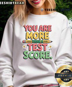 Nice You Are More Than A Test Score Testing Day Sweatshirt in vibrant colors, promoting positive testing mindset.