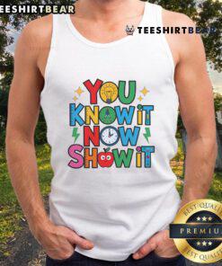 Teacher wearing a 'Nice You Know It Now Show It' motivational tank top on testing day, inspiring students with confidence.