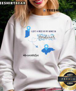 Alt Text: Cozy 'I Left A Piece Of My Heart In Honduras' sweatshirt featuring vibrant graphics and a comfortable fit.