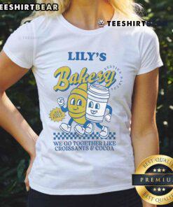 Official Lilys Bakery We Go Together Like Croissants And Cocoa Ladies Tee in pastel colors with playful design.