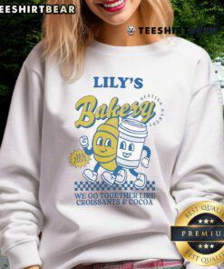 Cozy 'We Go Together Like Croissants And Cocoa' sweatshirt from Official Lily's Bakery, perfect for food lovers.