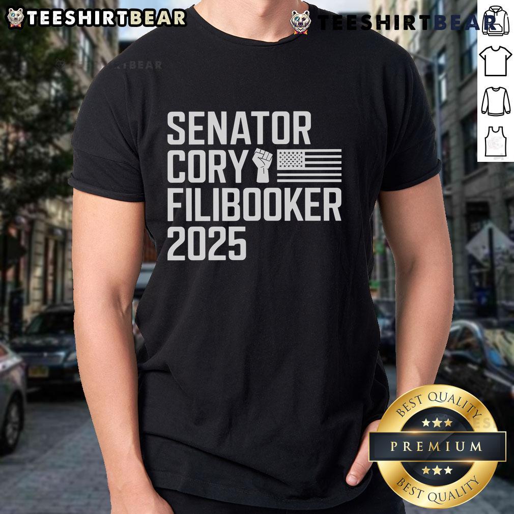 Pretty Senator Cory Booker wearing a 'Cory Filibooker' T-shirt during a filibuster event, showcasing his advocacy.