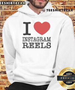 Pretty Tamir Omari wearing 'I Love Instagram Reels' hoodie, showcasing trendy streetwear style and vibrant colors.