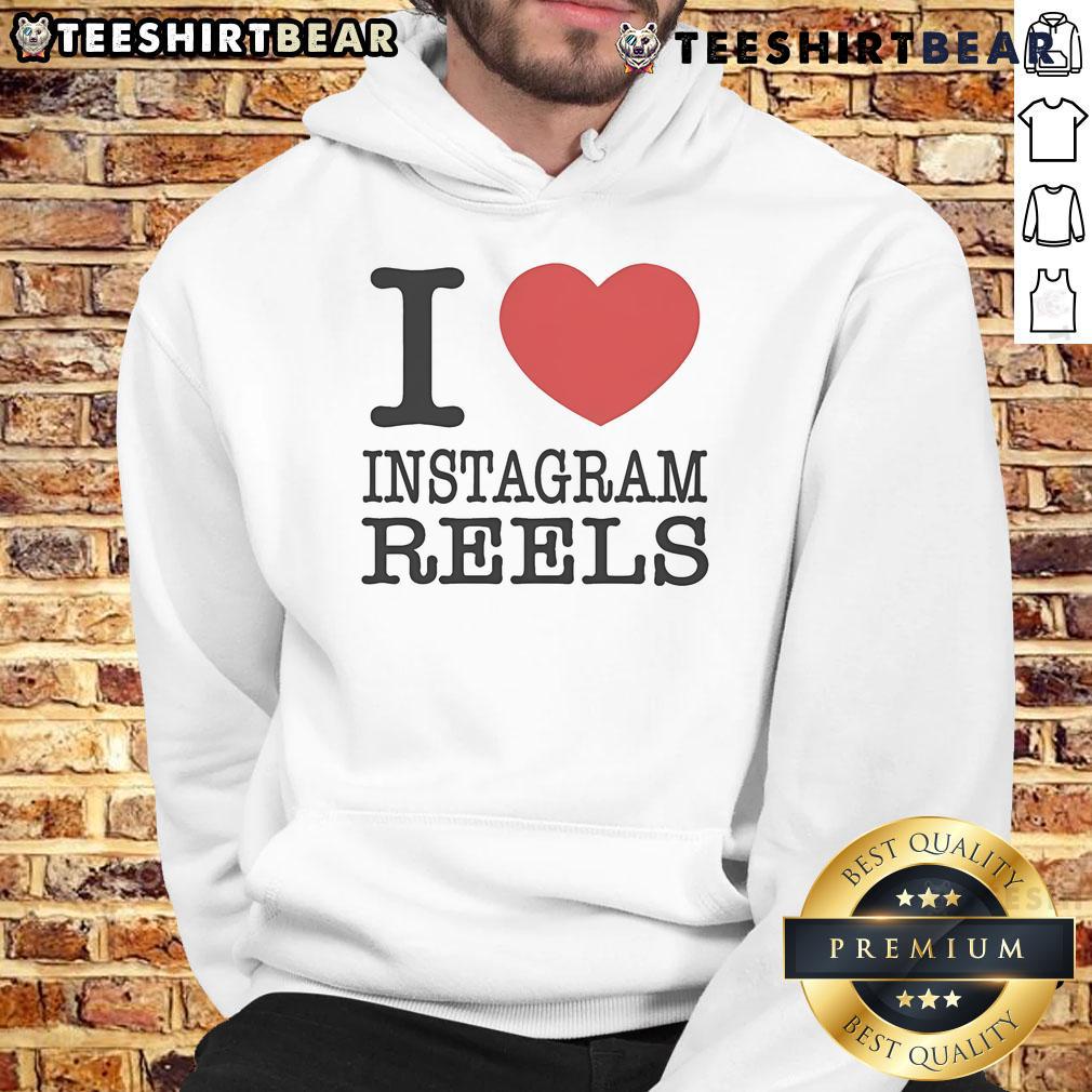 Pretty Tamir Omari wearing 'I Love Instagram Reels' hoodie, showcasing trendy streetwear style and vibrant colors.