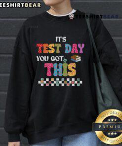 Alt Text: Student wearing Pretty Testing Motivation sweatshirt on test day, encouraging confidence and positivity.