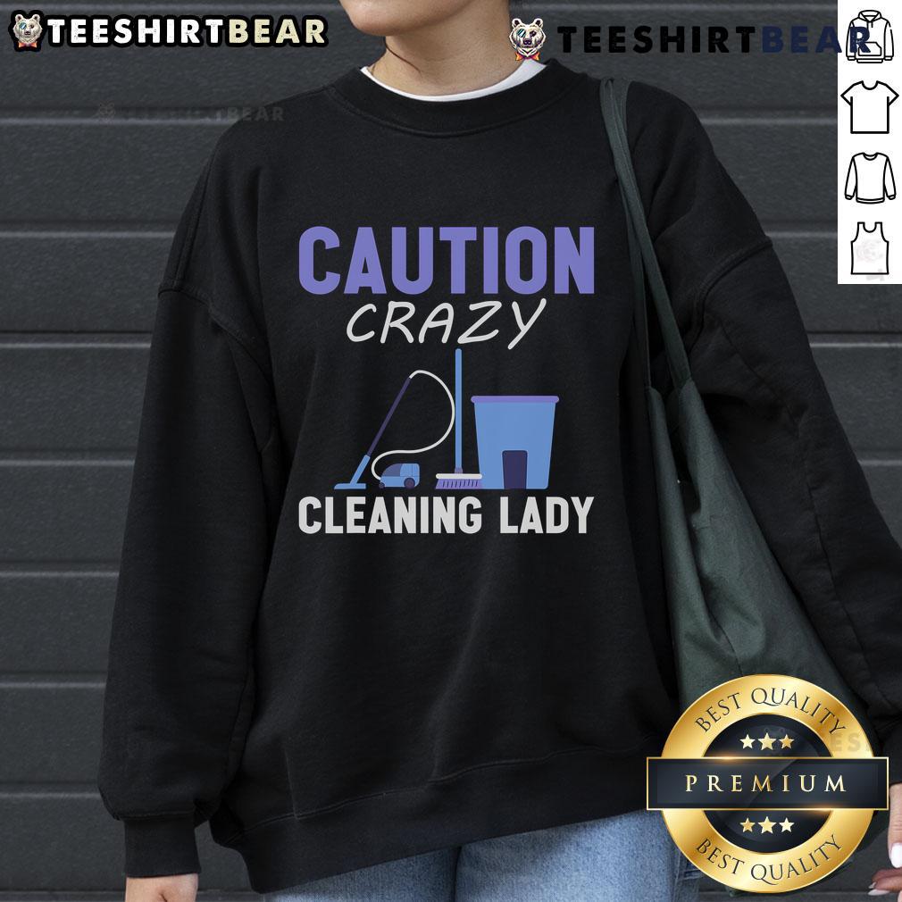 Top Caution Crazy Cleaning Lady Sweatshirt featuring a fun graphic design, perfect for cleaning enthusiasts and casual wear.