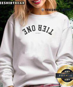 Alt Text: Stylish Top Connor Tomlinson Tier One Sweatshirt in black, perfect for casual wear and fan merchandise.