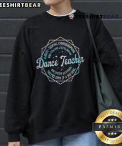 Alt Text: Top dance teacher wearing a cozy sweatshirt, ready for back-to-school dance classes and inspiring students.