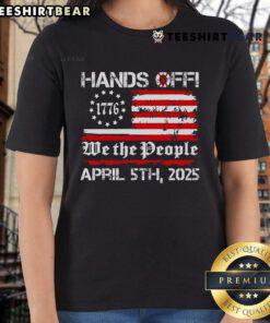 Women in USA flag tees at the Hands-Off Protest on Saturday, April 5, showcasing unity and empowerment.