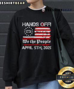 USA Flag sweatshirt worn at Top Hands Off Protest on Saturday, April 5, showcasing patriotic fashion and activism.